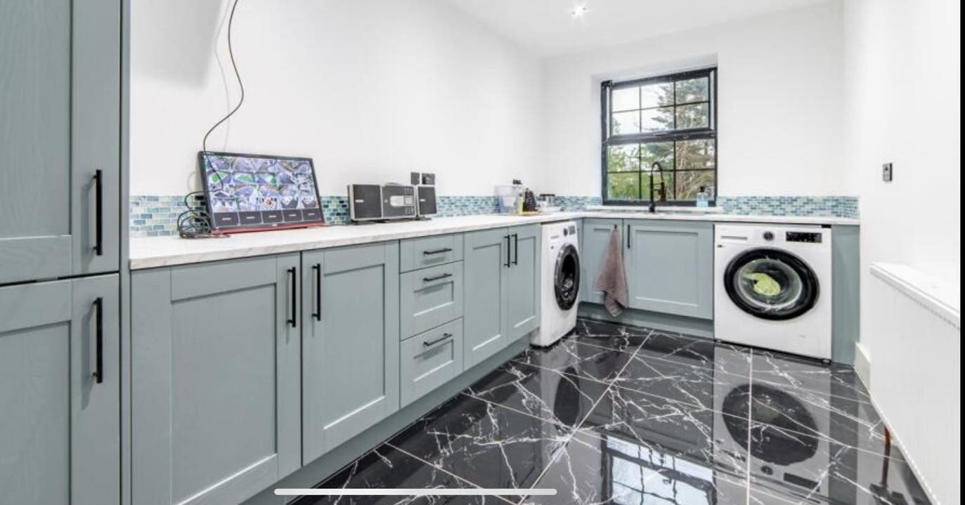 High-specification utility room with integrated appliances